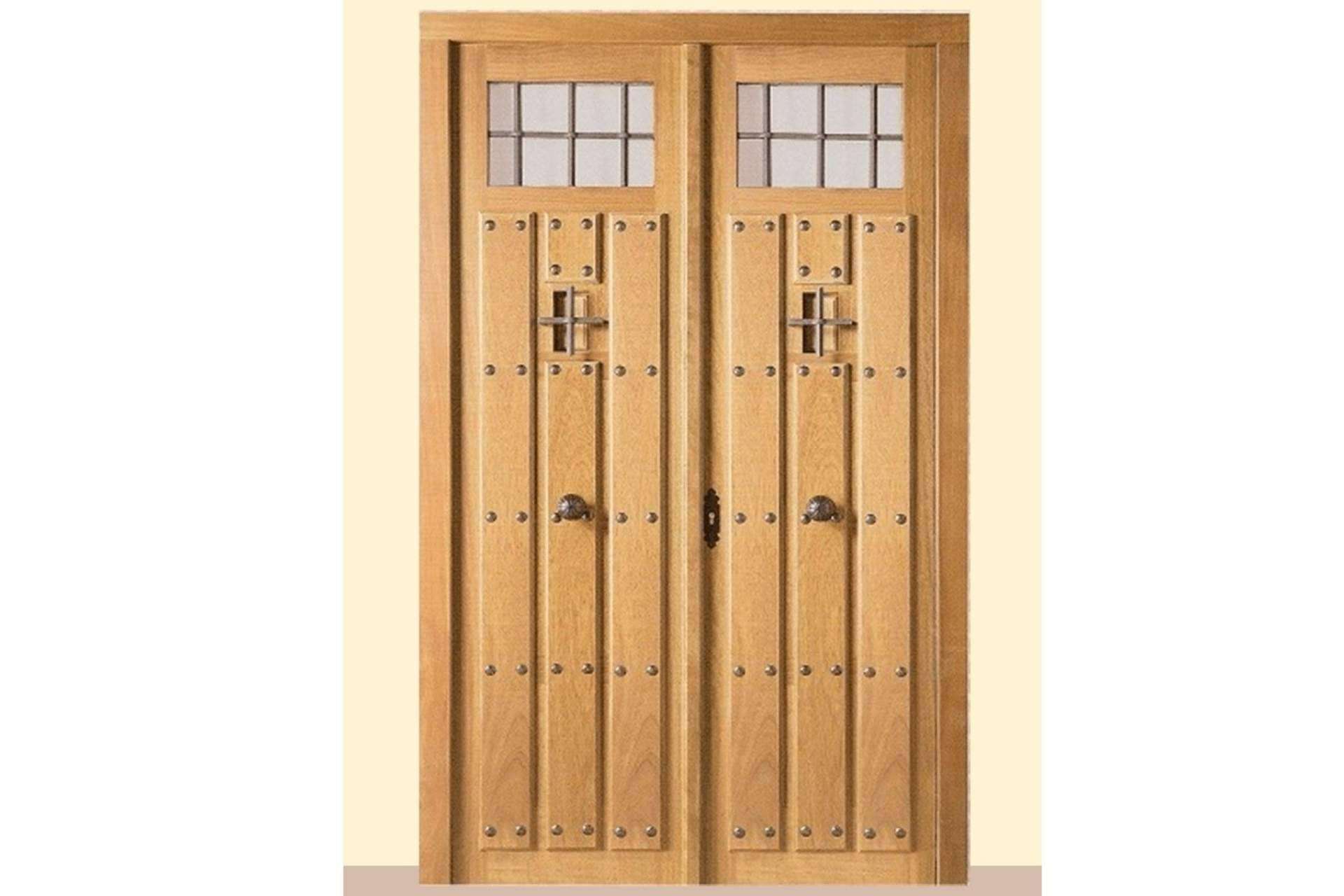 La puerta rústica exterior es la opción perfecta para la decoración de fincas, por Losma Studio