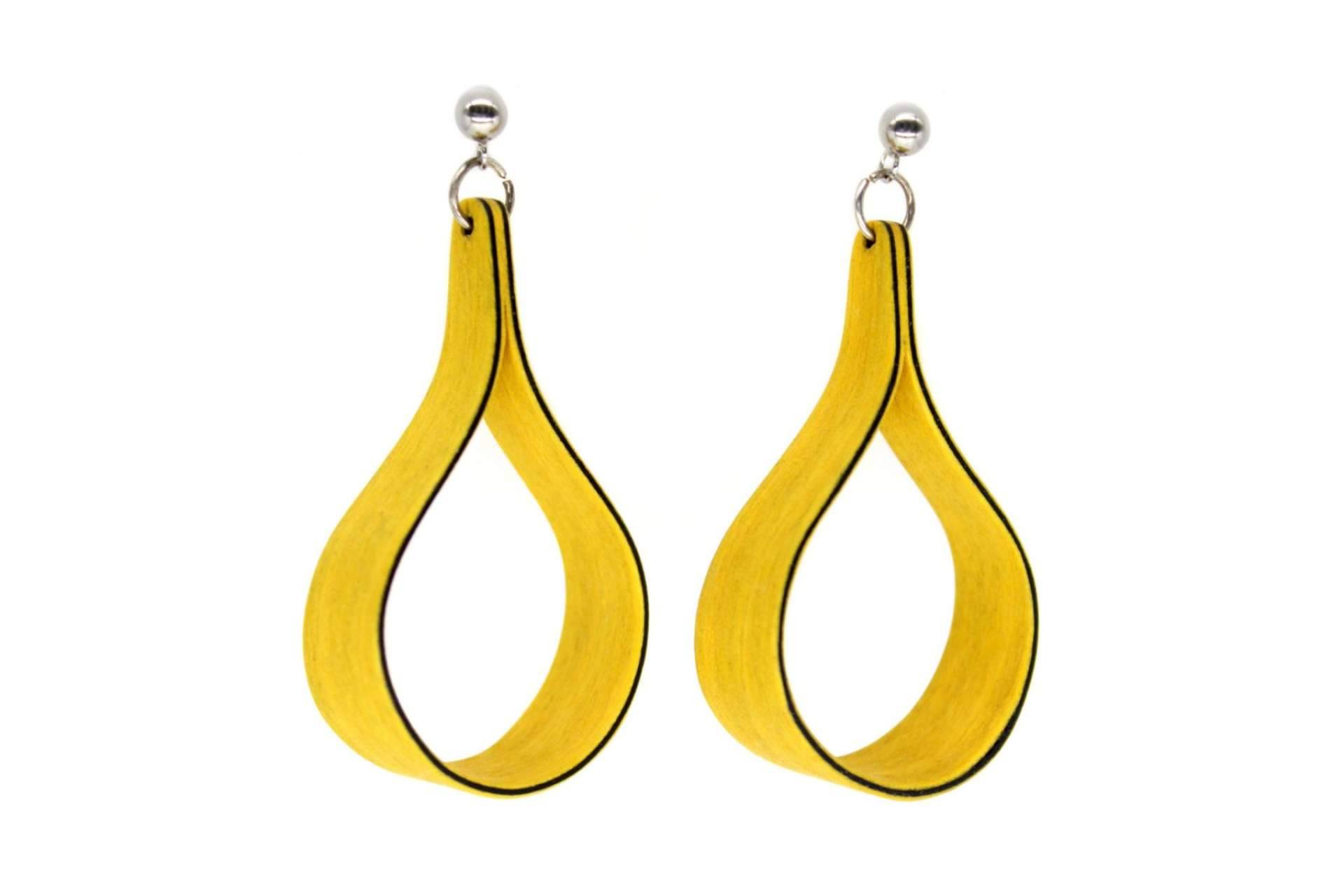 Accesorios de Madera ofrece joyas artesanales de madera natural